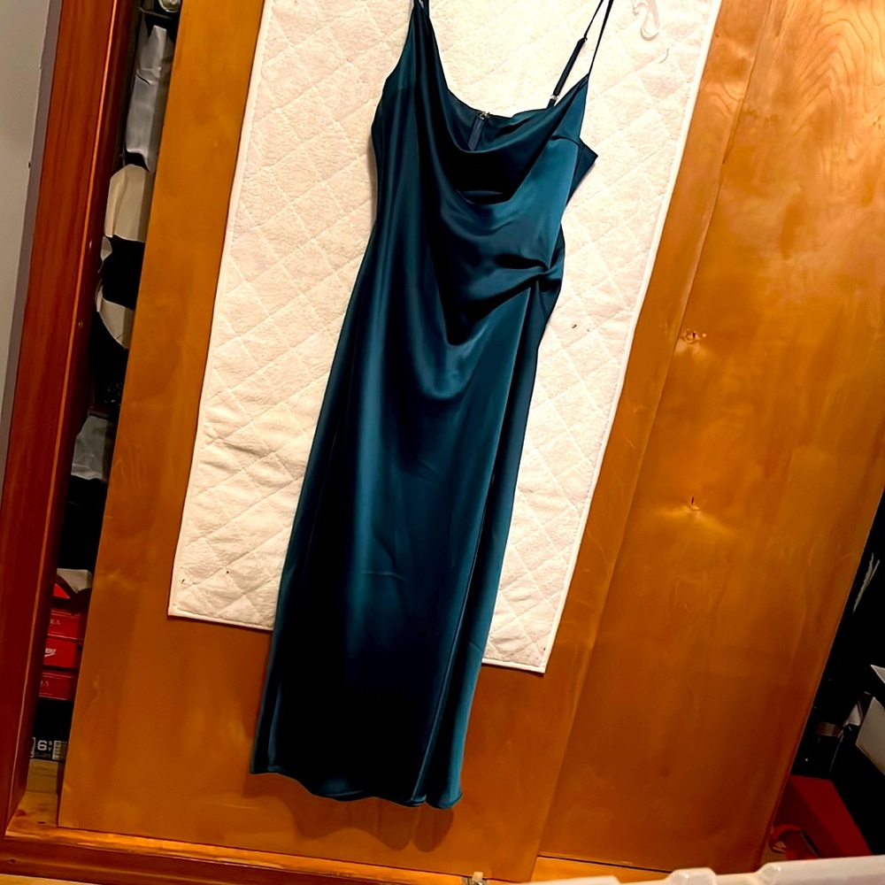 Spaghetti strap Dress with slit on side.